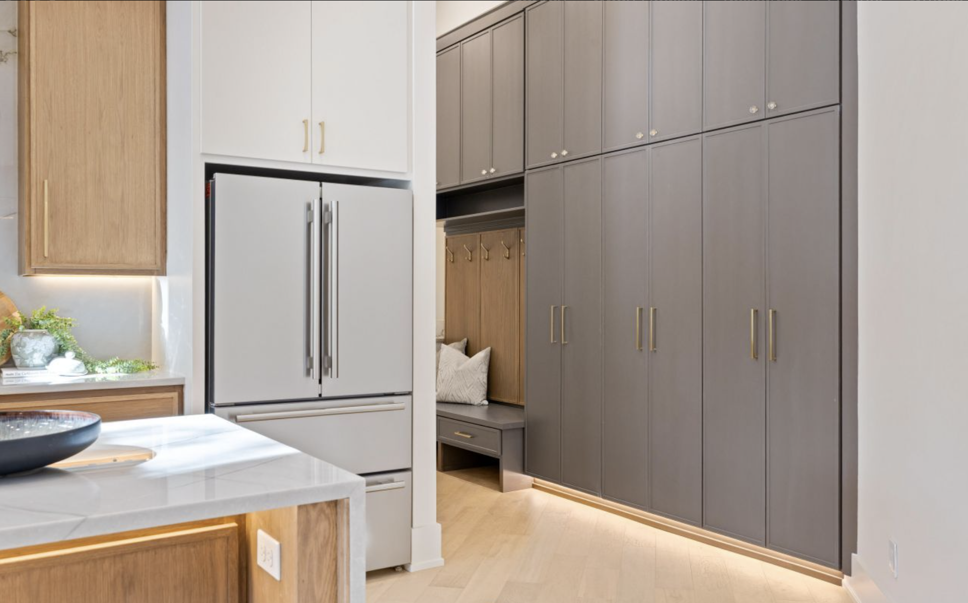 Complete mudroom remodel with custom storage cabinetry and bench seating
