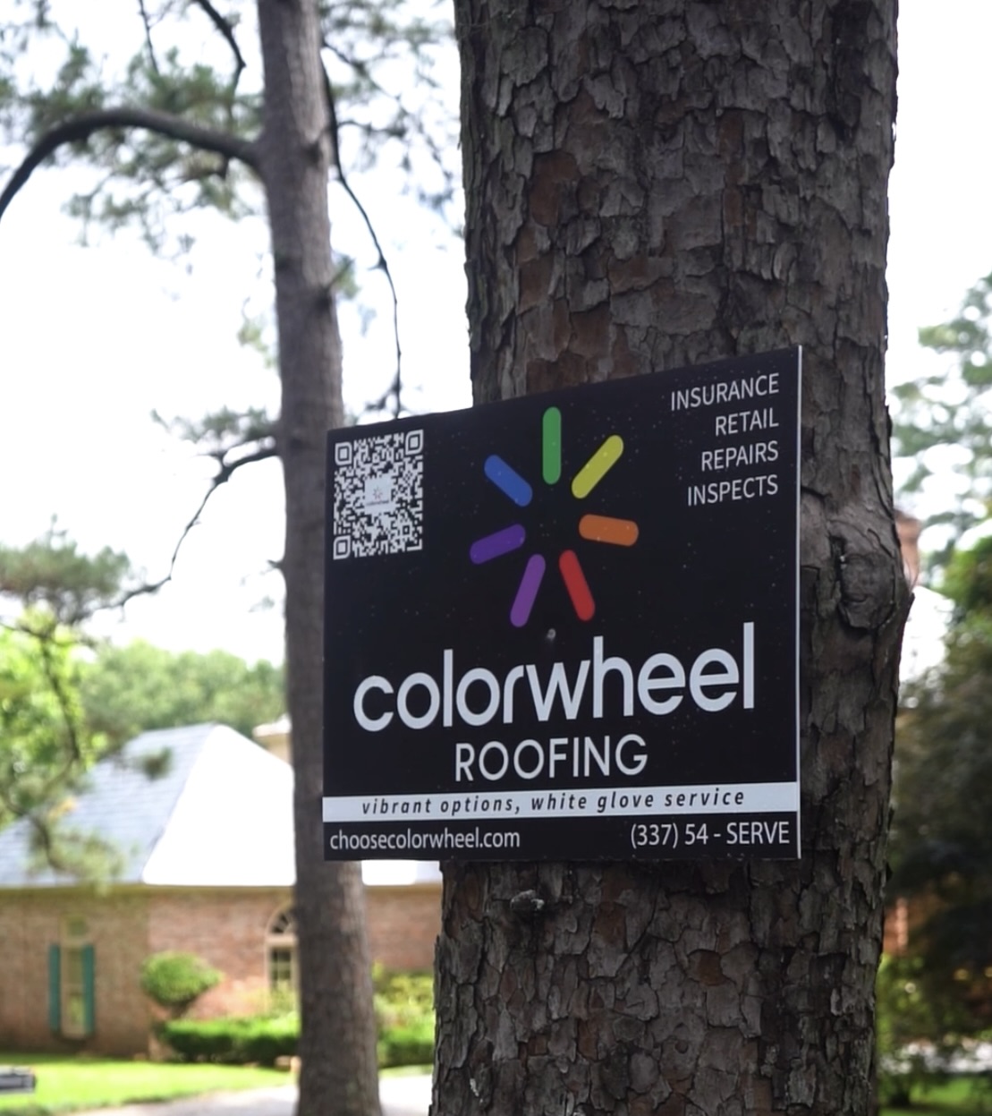 Colorwheel roofing professional installing shingles