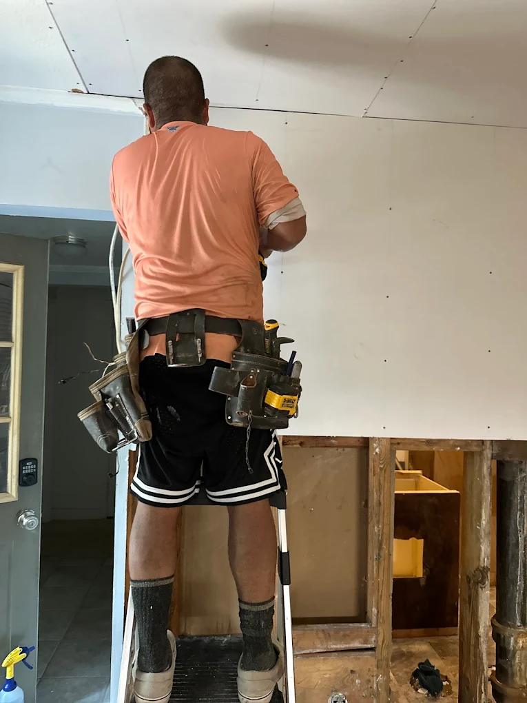 Construction phase showing professional drywall installation